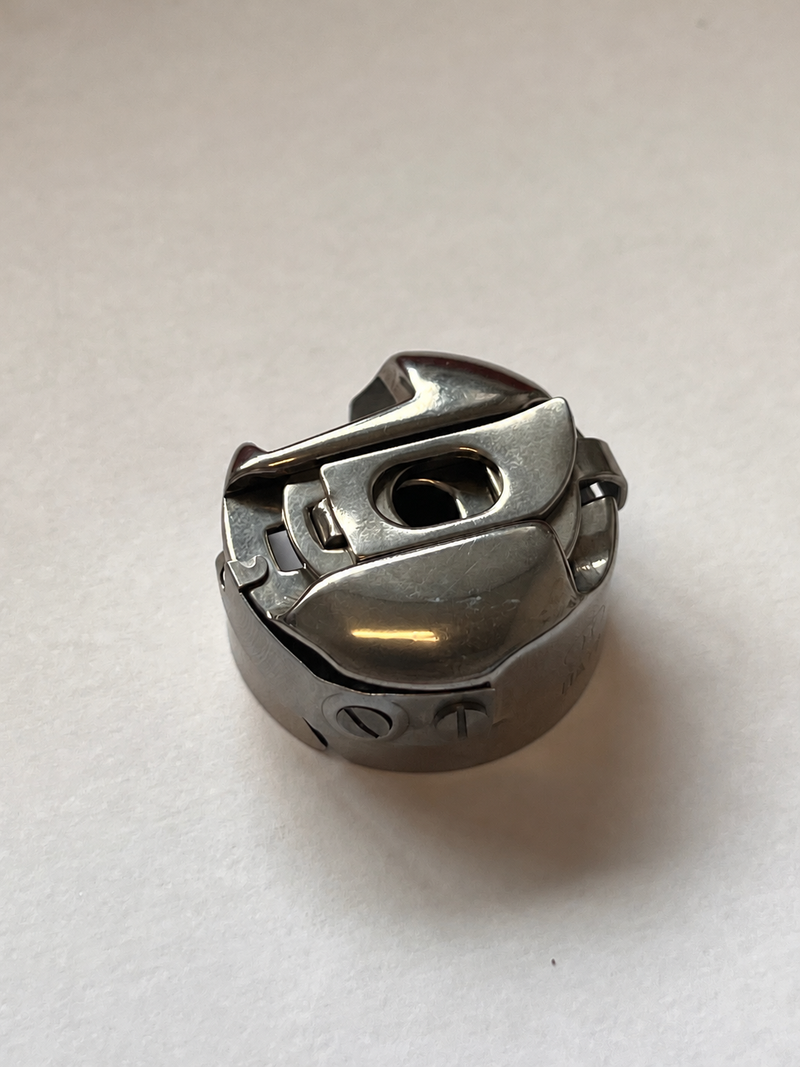 Load image into Gallery viewer, New Genuine Pfaff bobbin case

